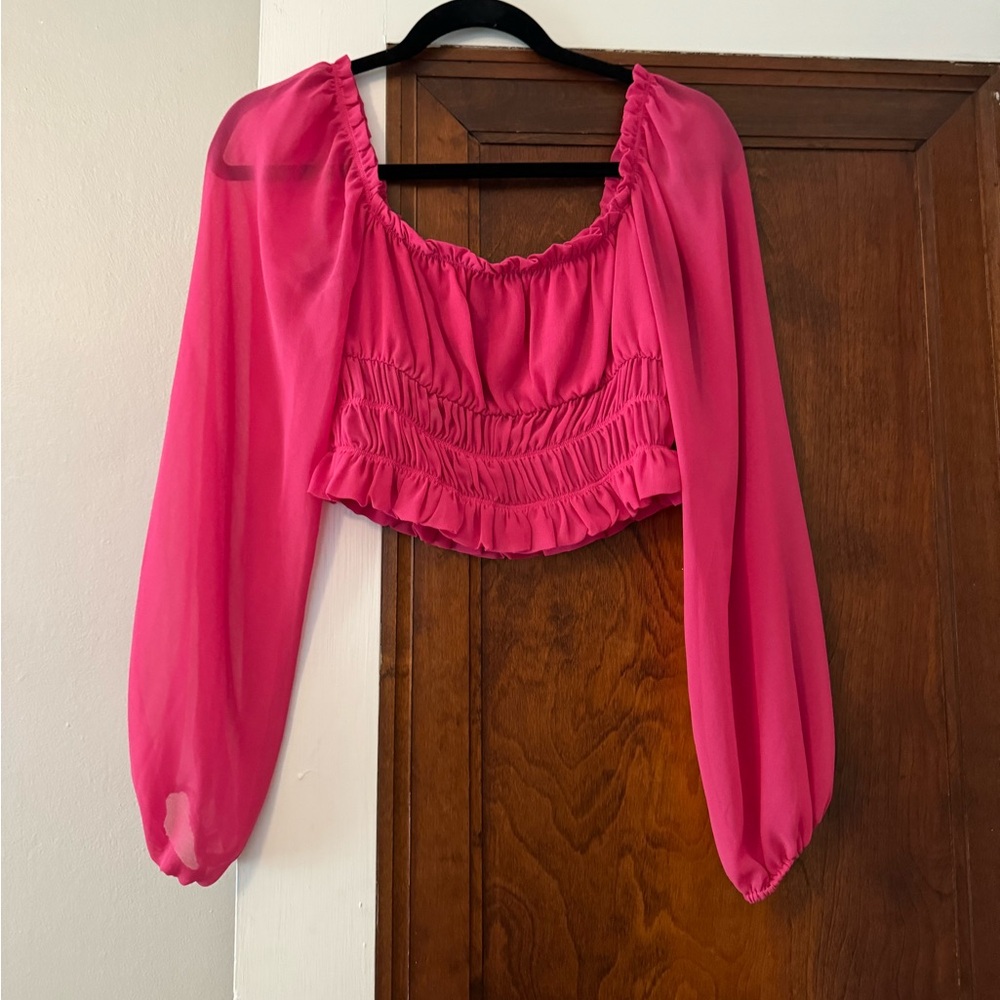 Pink ruffled long sleeve blouse with sheer sleeves